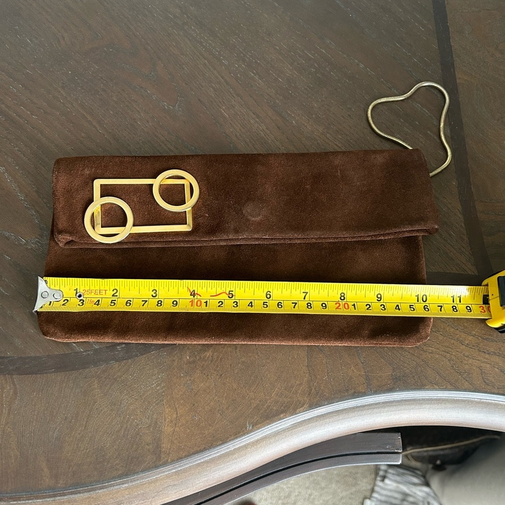 Brown leather clutch with minimalist gold-tone details and gold chain wristlet - Picture 8 of 14